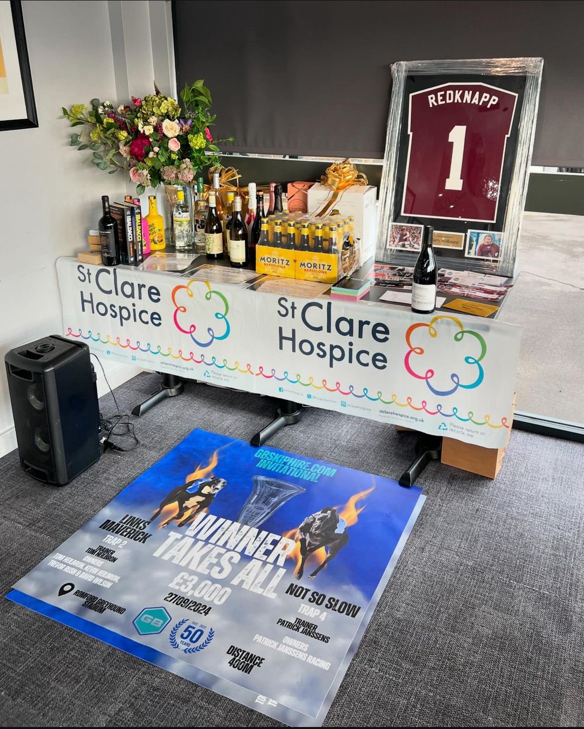 GB Skip Hire St Clare Hospice charity auction prizes at Romford Dogs event